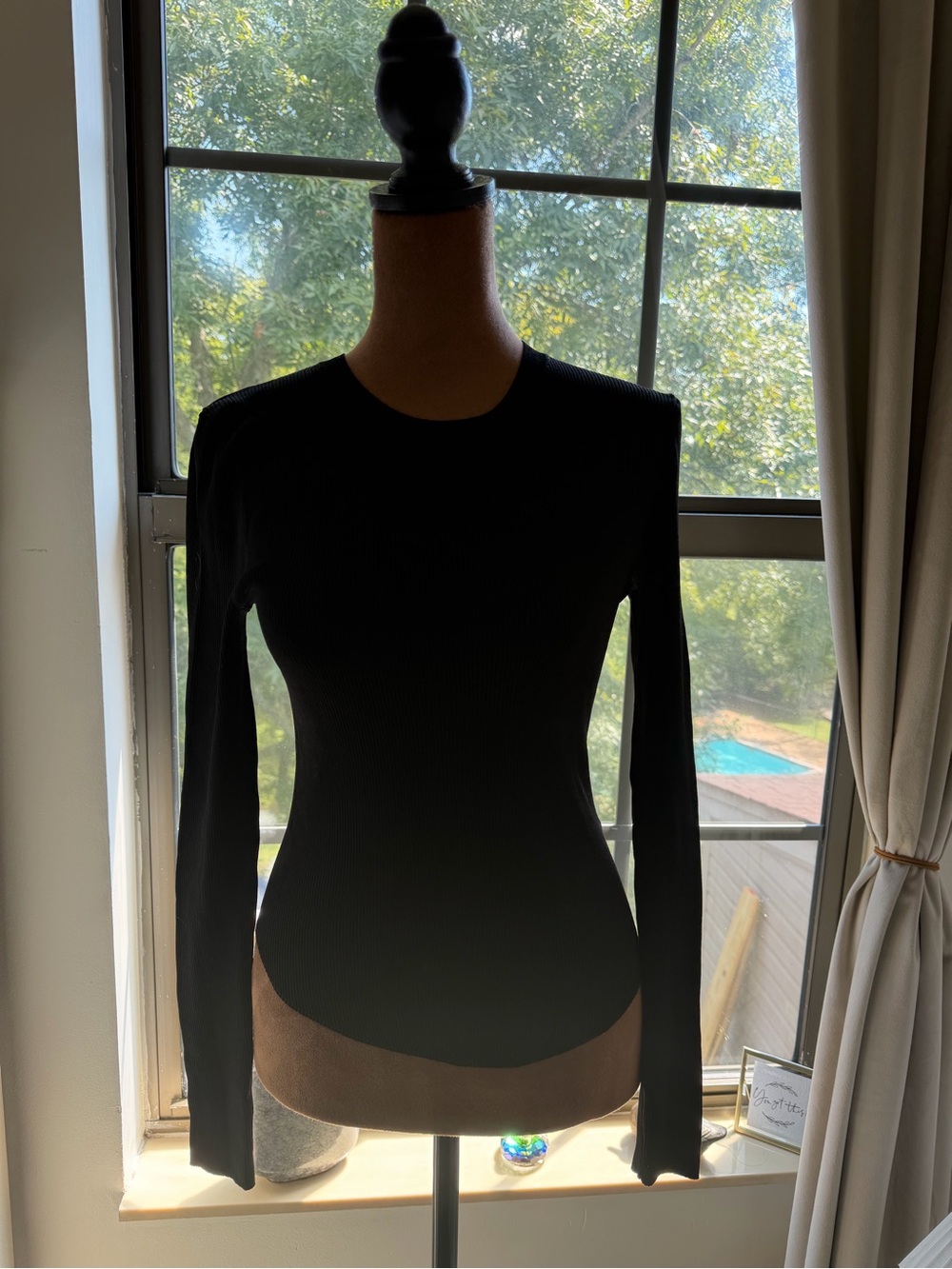 Babaton Black Ribbed Long-Sleeve Bodysuit